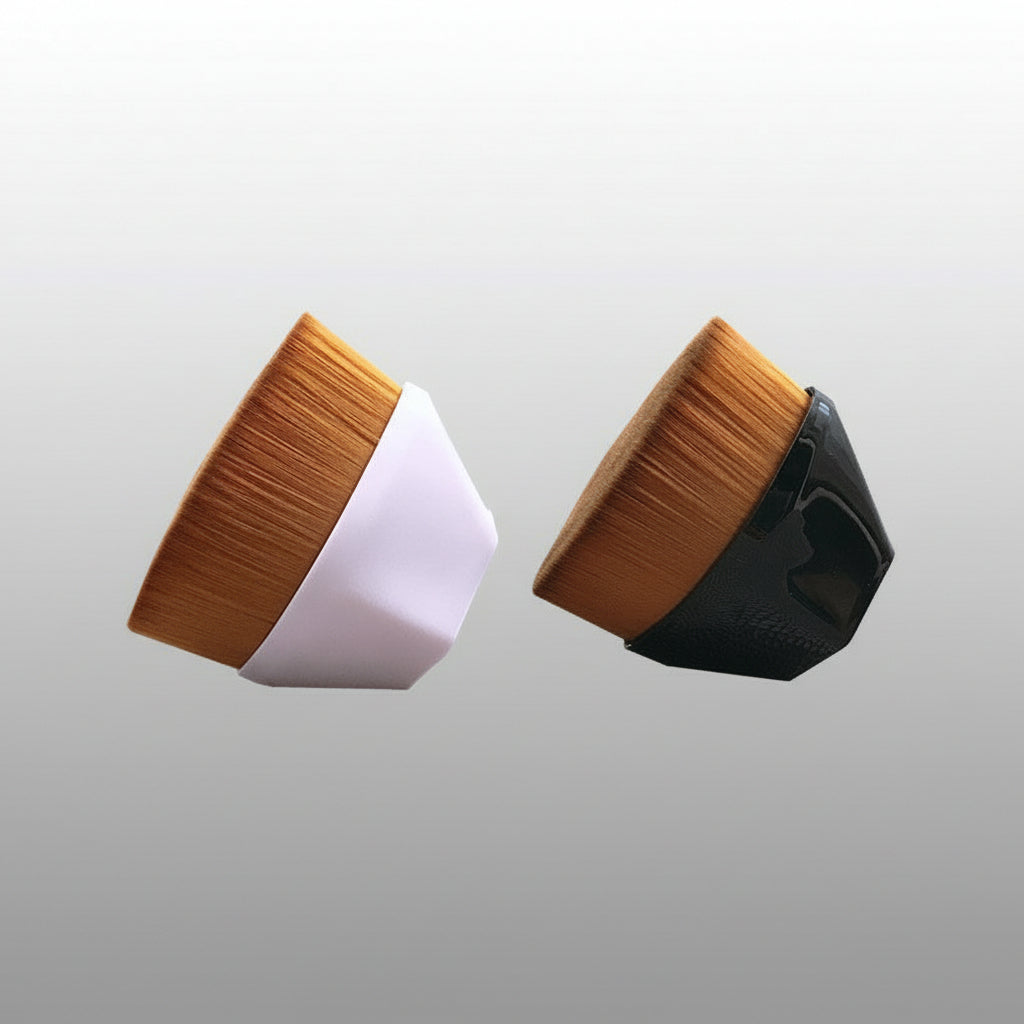 Two makeup brushes with wooden bristles and black and white handles on a white background